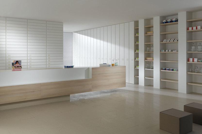 Impressionen einer Apothekeneinrichtung Impressionen einer Apothekeneinrichtung mit hellen Holzmöbeln und geräumigem Regalsystem, sowie aufgeräumten Empfang.